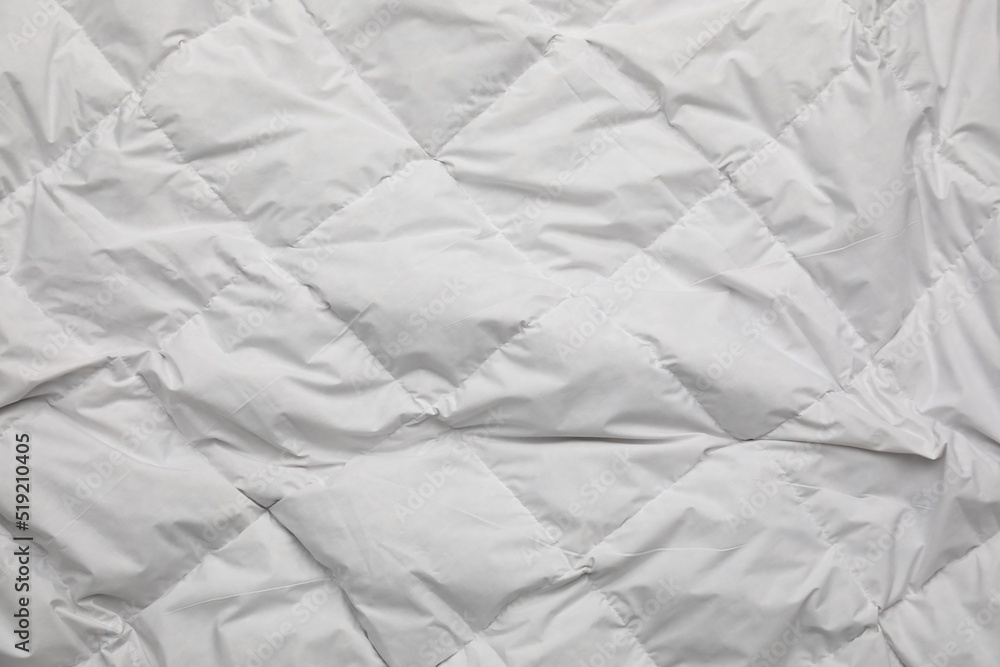 Obraz premium Soft crumpled blanket as background, top view