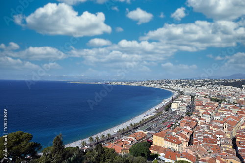 Beach and Nice town in summer landscape