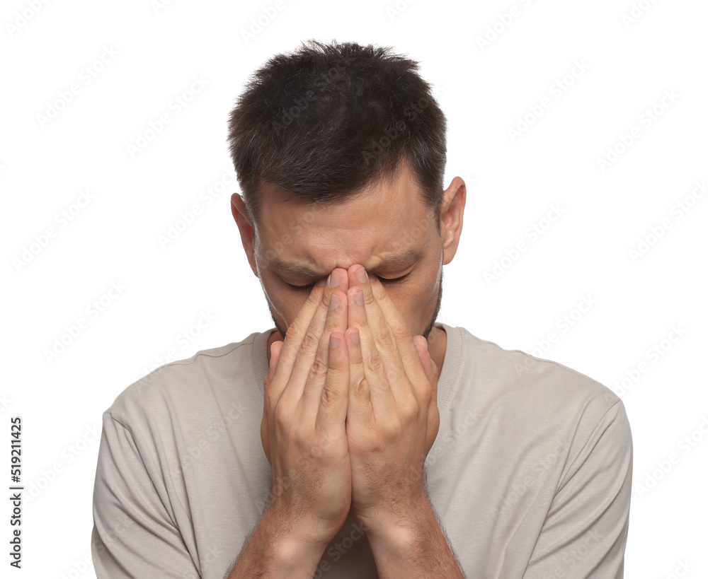 Man suffering from eyestrain on white background Man suffering from eyestrain on white background