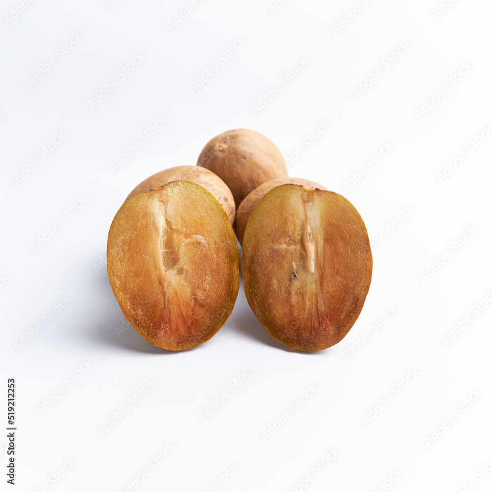 Sapodilla and fresh fruit isolated on a white background Sapodilla and fresh fruit isolated on a white background