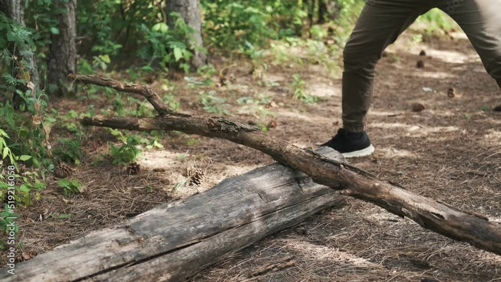 The guy is chopping wood with an axe. Woodcutter in the forest. cutting down trees
The guy is chopping wood with an axe. Woodcutter in the forest. cutting down trees