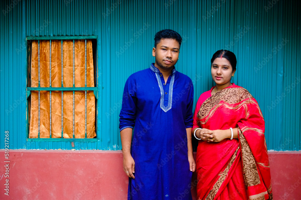 South asian newly married couple with traditional dress South asian newly married couple with traditional dress