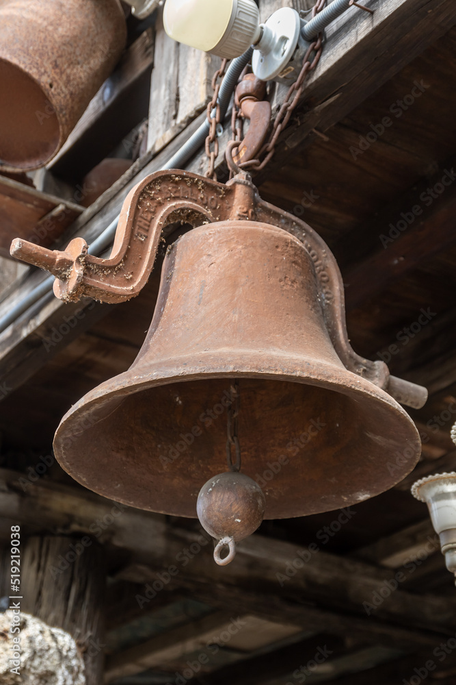 Fototapeta premium old bell on the wall