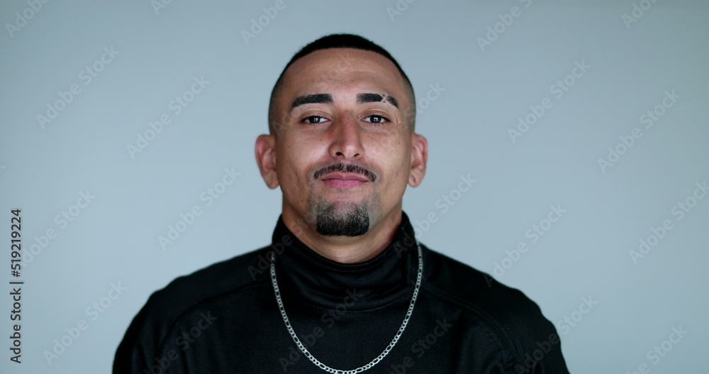 Hispanic young man portrait looking at camera. Latino south american guy Hispanic young man portrait looking at camera. Latino south american guy