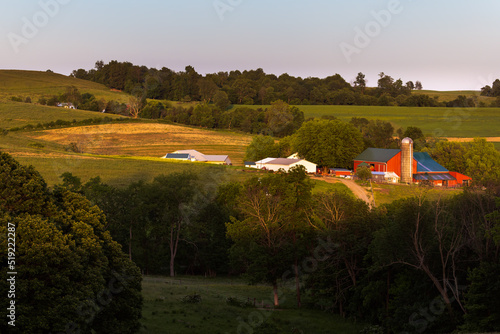 Amish farm in a valley among the rolling hills of Holmes County farmland