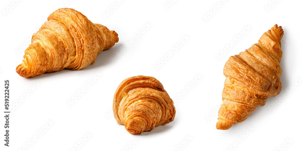 Fresh baked Croissants isolated on white background. Delicious french croissant on a white background.  Different angles. Front, top view.