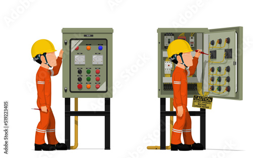 Industrial workers use screwdriver tester to measuring electric current in the electrical control cabinet