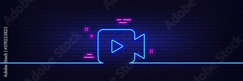 Neon light glow effect. Video Camera line icon. Movie or Cinema sign. Multimedia symbol. 3d line neon glow icon. Brick wall banner. Video camera outline. Vector