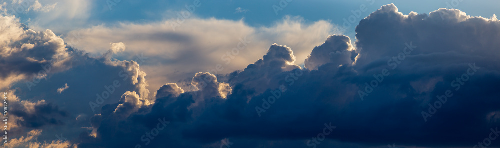 Sky panorama. Beautiful dramatic big clouds in the sky. Landscape of the power of heaven and nature. Copy space Sky panorama. Beautiful dramatic big clouds in the sky. Landscape of the power of heaven and nature. Copy space