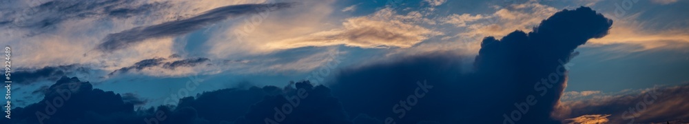 Sky panorama. Beautiful dramatic big clouds in the sky. Landscape of the power of heaven and nature. Copy space Sky panorama. Beautiful dramatic big clouds in the sky. Landscape of the power of heaven and nature. Copy space