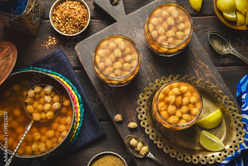 Arabic Cuisine; Egyptian traditional chickpeas drink "Hummus Sham" or "Halabessa". A delicious popular drink in Egypt. It is Chickpeas in garlic tomato broth with lemon and spices.