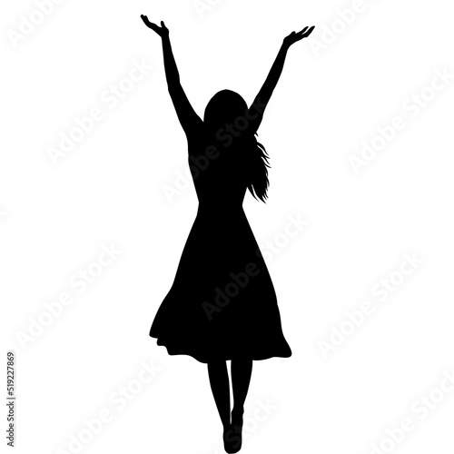 Silhouette of woman in long dress with arms raised up enjoying life