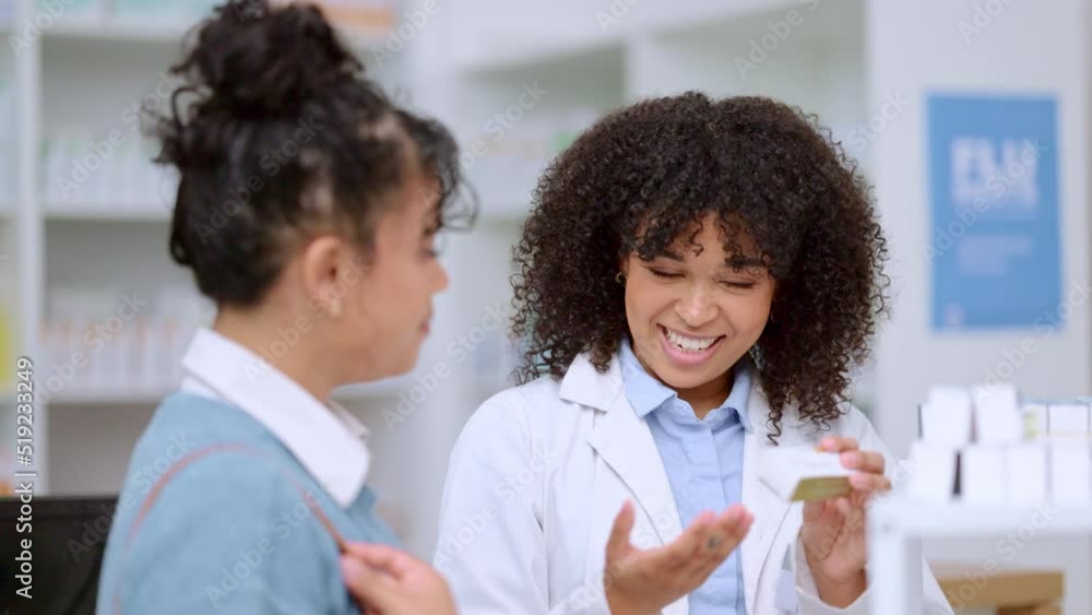 Happy professional pharmacist woman in pharmacy helping customer. Female expert giving information in detail on clients prescription. Experienced consultant giving clear instructions on medication. Happy professional pharmacist woman in pharmacy helping customer. Female expert giving information in detail on clients prescription. Experienced consultant giving clear instructions on medication.