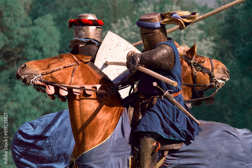 Murais de parede Two knights attack each other with galloping spears