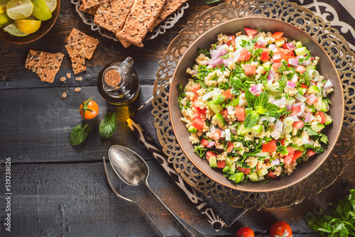 Arabic Cuisine; Traditional Mediterranean salad Tabbouleh or Tabouli Fototapet