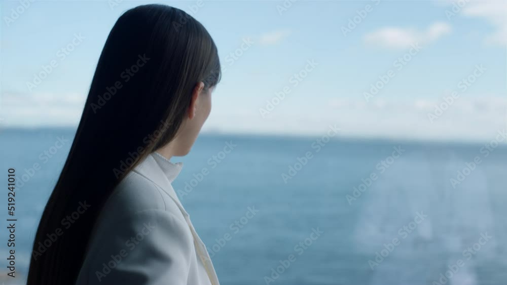 Closeup melancholic woman looking panoramic window. Business lifestyle concept Closeup melancholic woman looking panoramic window. Business lifestyle concept