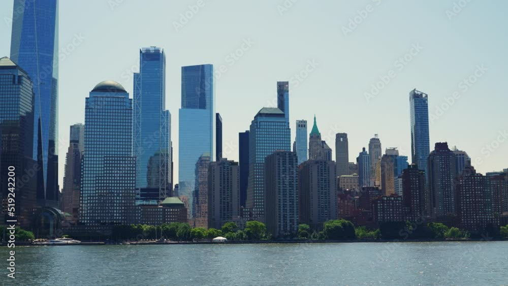 Modern High Rising Glass Buildings of Manhattan with Reflections on Windows Modern High Rising Glass Buildings of Manhattan with Reflections on Windows
