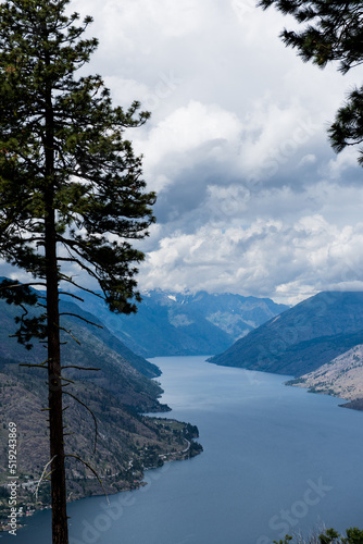View of Lake Chelan Washington, dark clouds covering mountain top