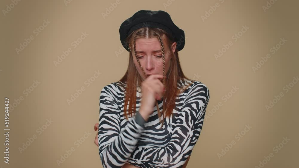 Stressed depressed woman terrified about danger problems, suffering phobia, anxiety disorder, expresses fear, waving no, insecure, stress, panic. Adult girl isolated on beige studio background indoors Stressed depressed woman terrified about danger problems, suffering phobia, anxiety disorder, expresses fear, waving no, insecure, stress, panic. Adult girl isolated on beige studio background indoors