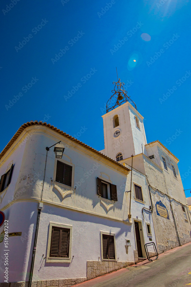 Fototapeta premium The Torre do Relogio Clock Tower in the historical old town area of Albufeira in Portugal