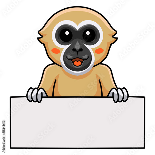 Cute white handed gibbon monkey cartoon holding blank sign