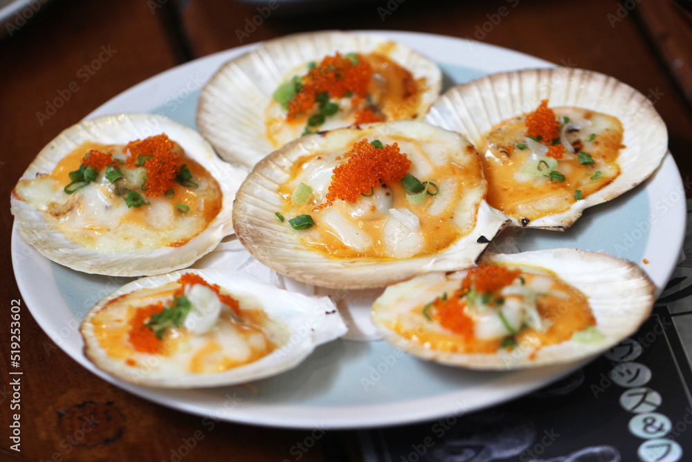 grilled scallops shell with butter,cheese, garlic  and eggs shrimp toping