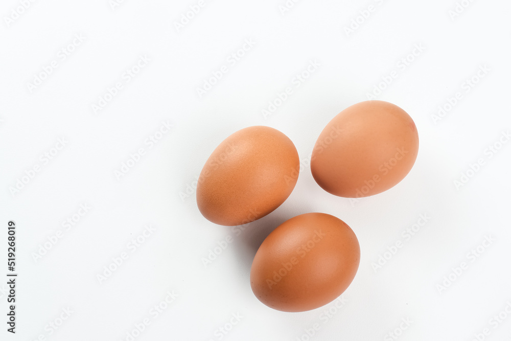 Raw organic farm eggs. Served in basket, copy space. 
