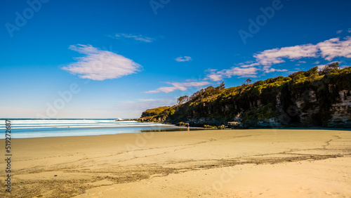 Cave beach under beautiful sky in Booderee National Park photo