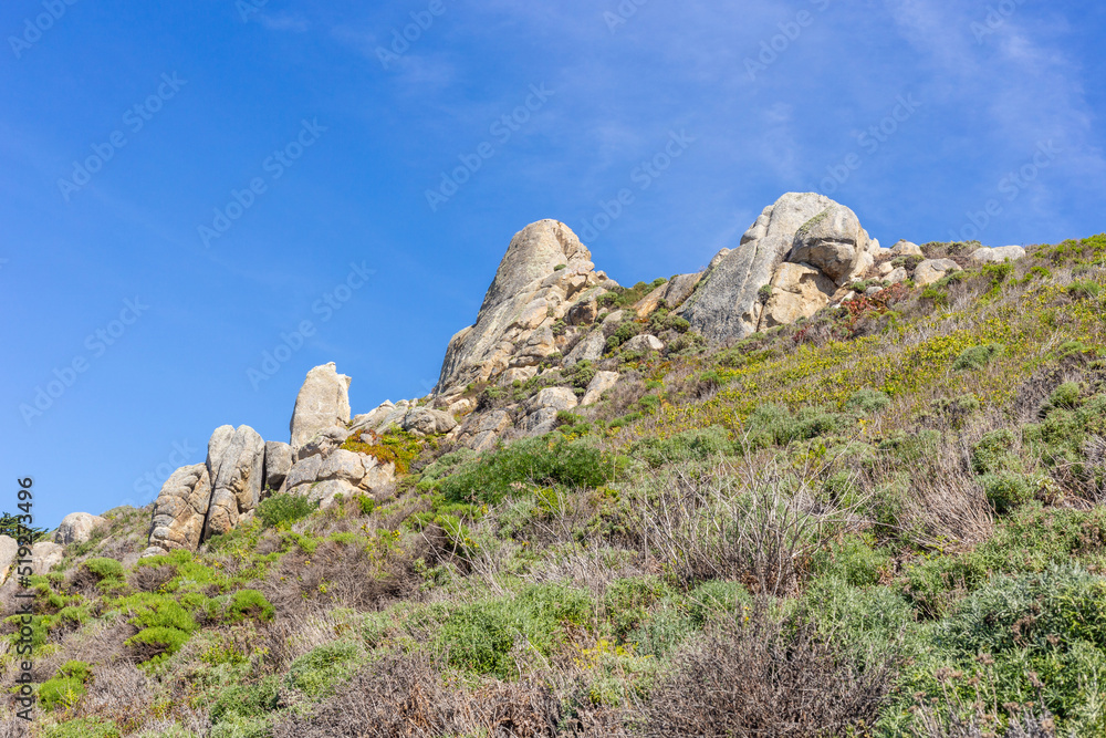 A view on Pacific ocean coast with blue sky and water and waves A view on Pacific ocean coast with blue sky and water and waves