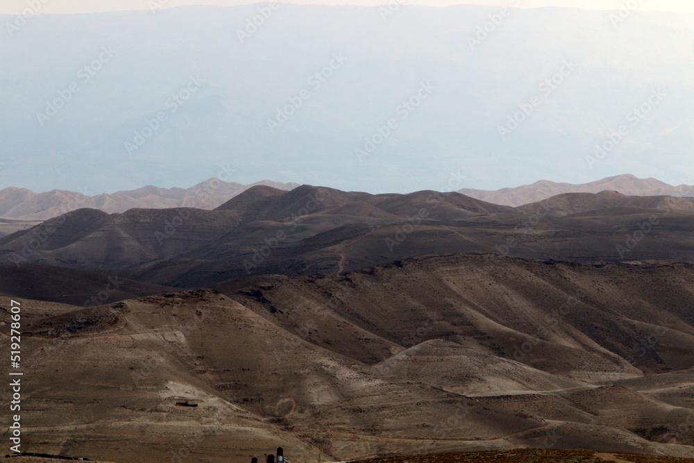 Naklejka premium The Judean Desert in the Middle East in Israel. Since ancient times, this place has served as a refuge for hermits and rebels.