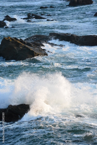 waves crashing on rocks