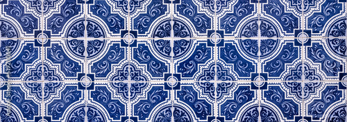     Azulejos in Portugal, detail on a typical house, blue color 

