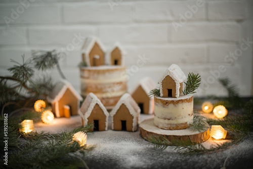Gingerbread Christmas houses sprinkled with powdered sugar
