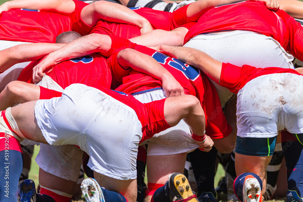 Rugby Game Players Close-Up Scrum Bind Rear Behind Action. Rugby Game Players Close-Up Scrum Bind Rear Behind Action.