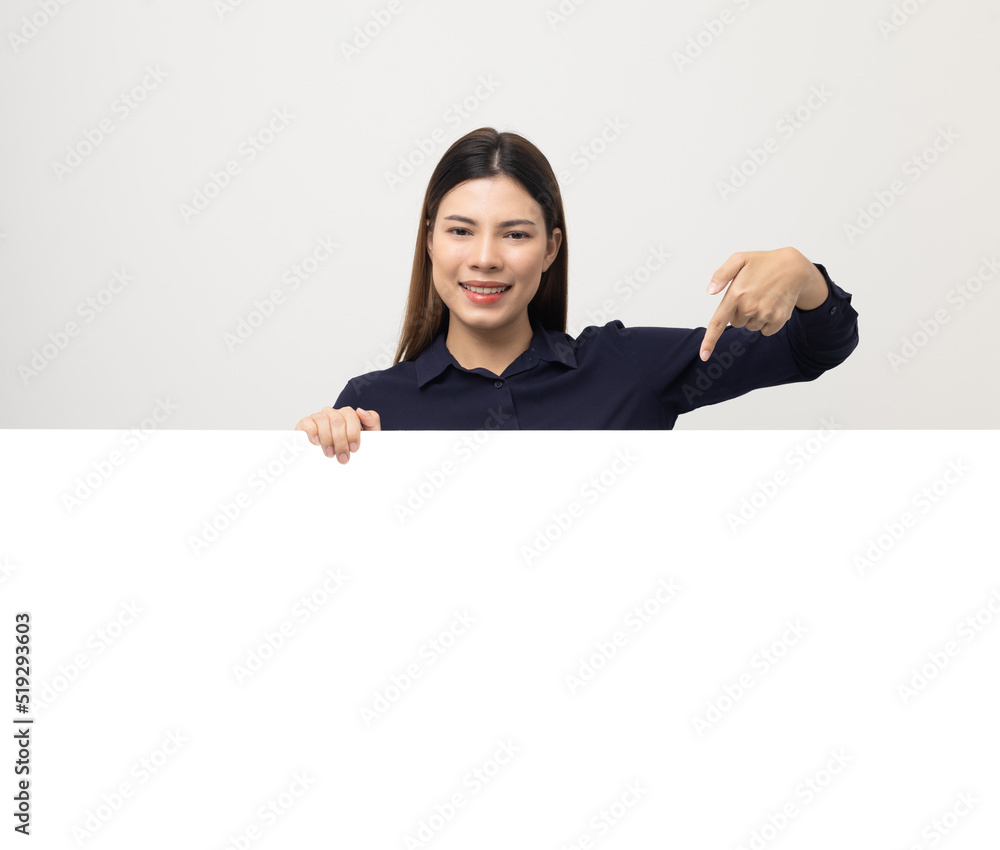 Portrait of Young beautiful mixed race woman standing and smiling on isolated white background with big mockup billboard for advertising text. Portrait of Young beautiful mixed race woman standing and smiling on isolated white background with big mockup billboard for advertising text.