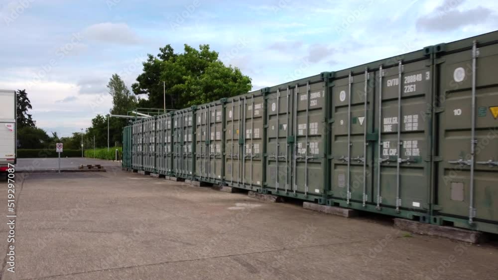 Row of shipping containers on an industrial building site in England Row of shipping containers on an industrial building site in England