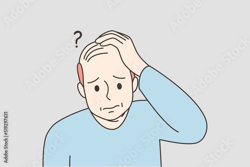 Unhappy man suffer from alopecia