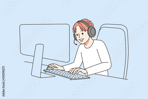 Boy playing video games on computer 