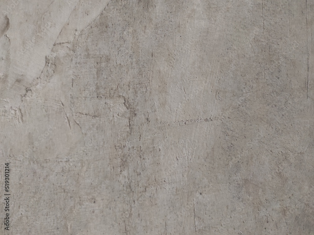 Wall fragment Texture with scratches and cracks.Stucco white wall background or texture.Cement wall white background or concrete texture.vintage cement wall background material.Graphite wall.