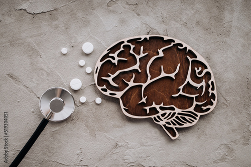 A stethoscope and brain with pills. Awareness of Alzheimer's, Parkinson's disease, dementia, stroke, seizure or mental health
