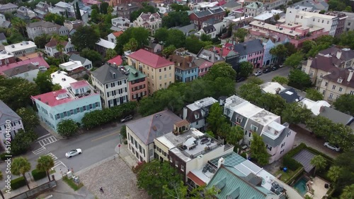 An overhead tracking drone shot of Rainbow Row in Charleston, SC. photo