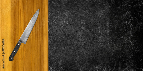 Topview of Cooking Knife and Cutting Board on Dark Background