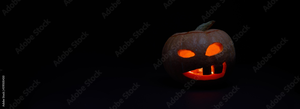 Halloween pumpkin with burning mouthst on dark background. Halloween pumpkin with burning mouthst on dark background.