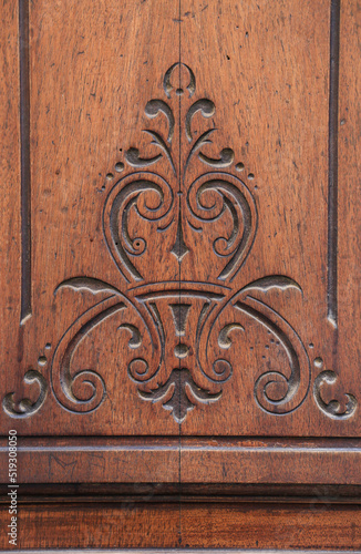 Carved details on vintage wooden door © SoniaBonet
