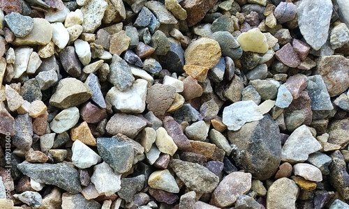 Abstract background with lot of various shape peeble stones.  photo