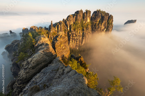 Schilderij op canvas Sunrise over Schrammsteine in Saxon Switzerland