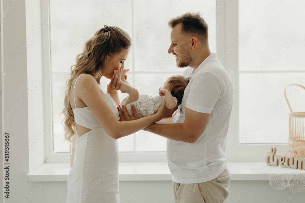 happy family portrait, happy family concept, parents and baby
happy family portrait, happy family concept, parents and baby
