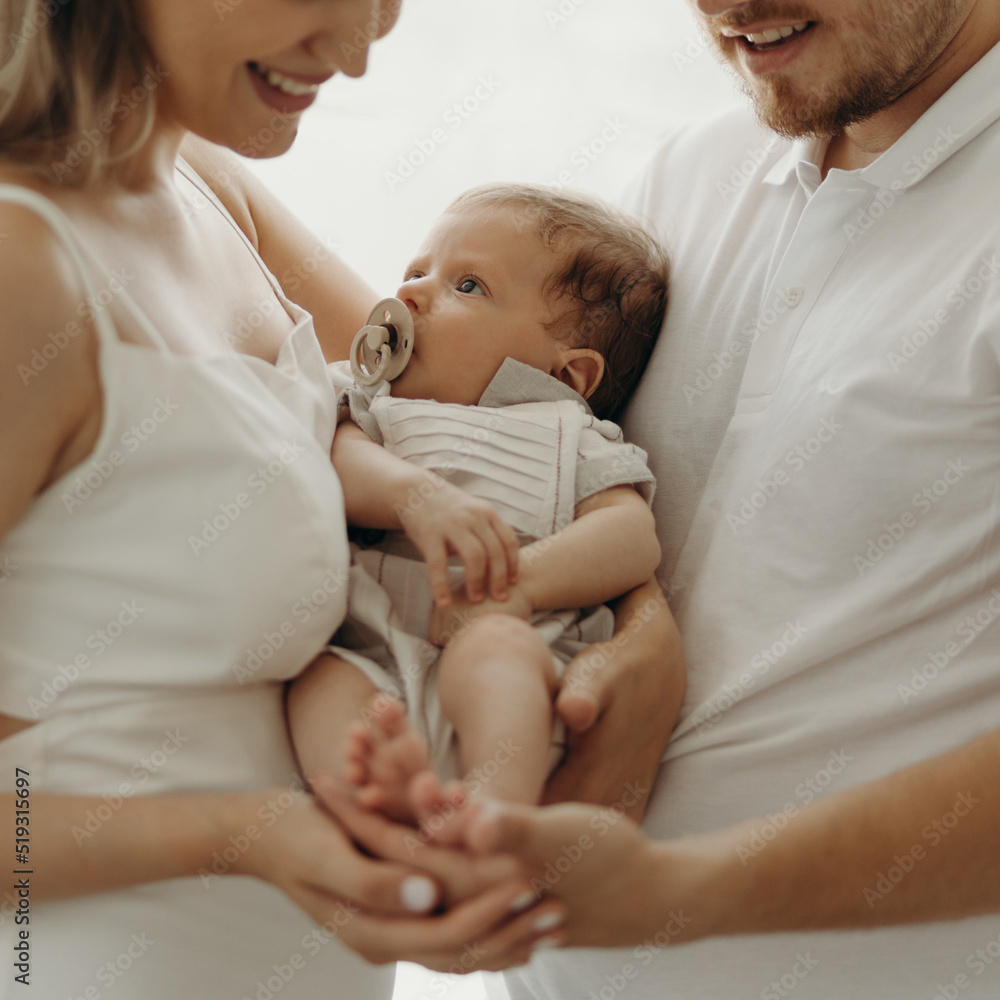 parent holding baby,
happy family portrait, happy family concept parent holding baby,
happy family portrait, happy family concept