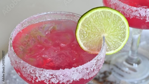 Wallpaper Mural Glass of red margarita drink with ice and green lime Torontodigital.ca