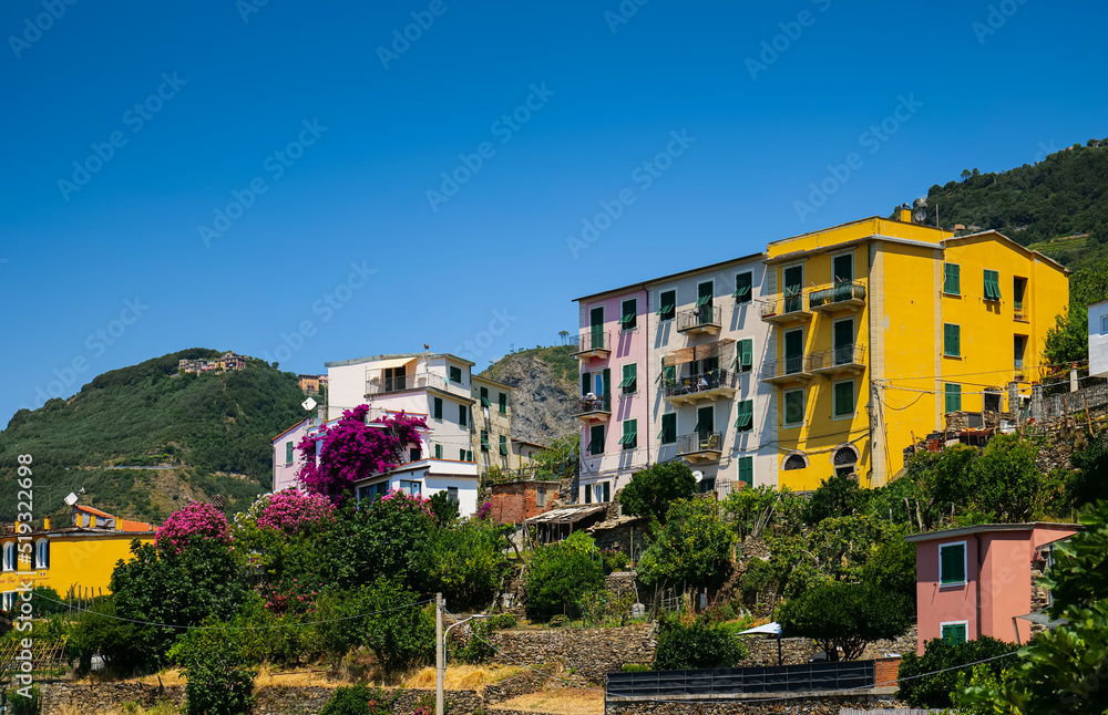 Obraz premium Travel to Cinque Terre (Five Lands in English). Aerial view over Corniglia architecture landmark village at the coast of Liguria Sea from Italy. 